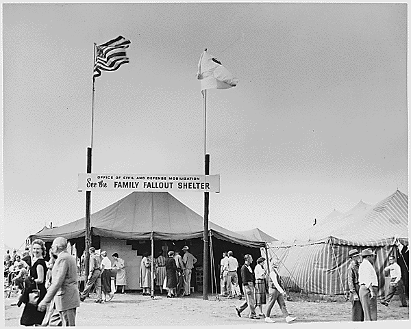 Photograph of the Office of Civil and Defense Mobilization exhibit at a local civil defense fair. ca. 1960.