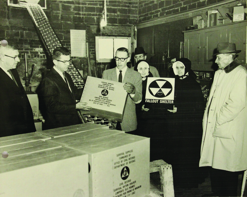 1963. a fallout shelter supplies being distributed to nuns at the Villa Augustina Academy in Goffstown, New Hampshire. The nuns in the photograph include Mother Wilfred and Mother Superior Liguori.