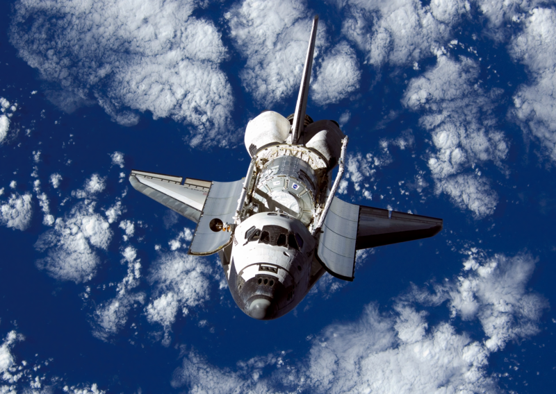 The Space Shuttle Discovery, casting no shadow.