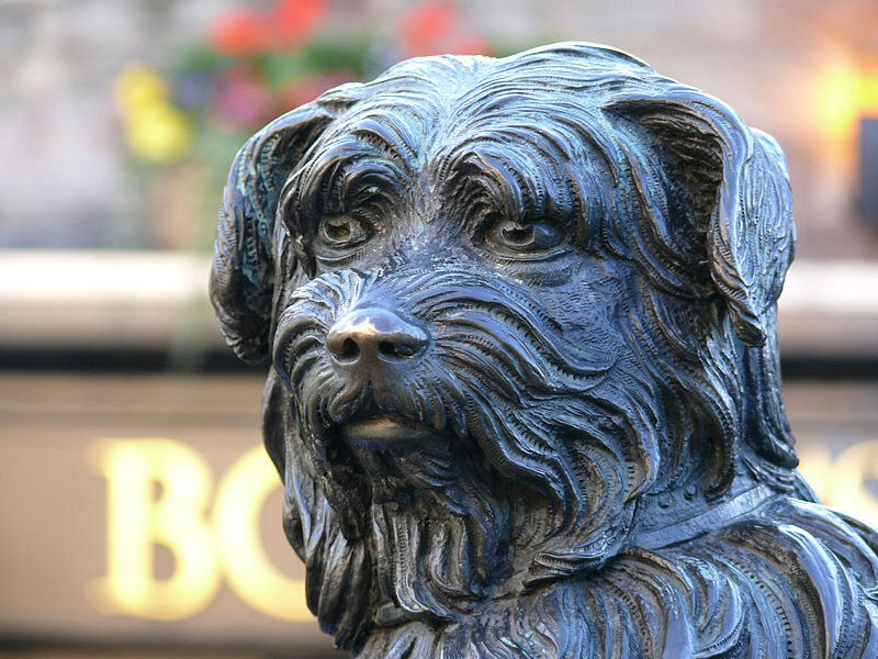 Statue of Greyfriars Bobby erected at the end of the George IV Bridge.