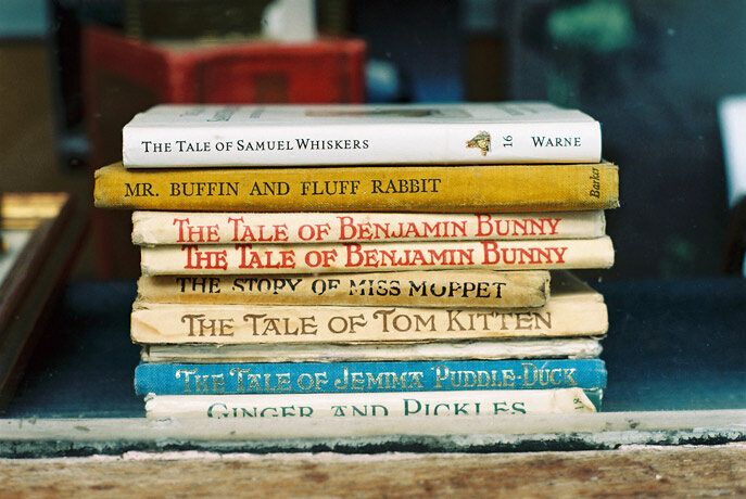 A stack of Beatrix Potter titles. 
