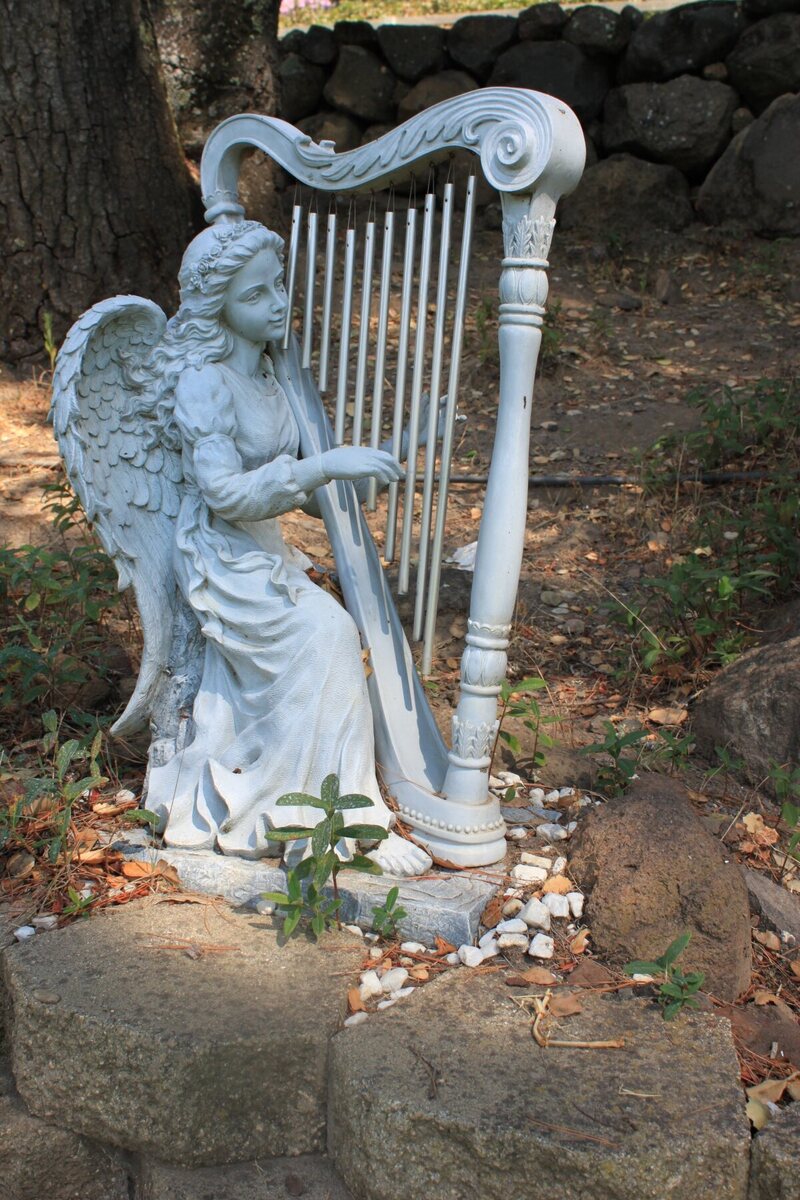 An angel plays a harp near the “Gentle Giants” section of Bubbling Well.