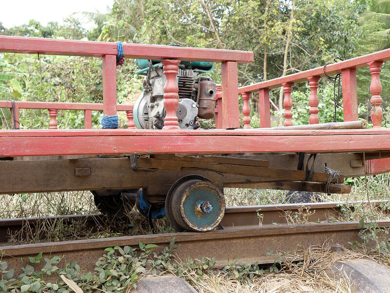 Old tractor engine rigged to power a Norry train