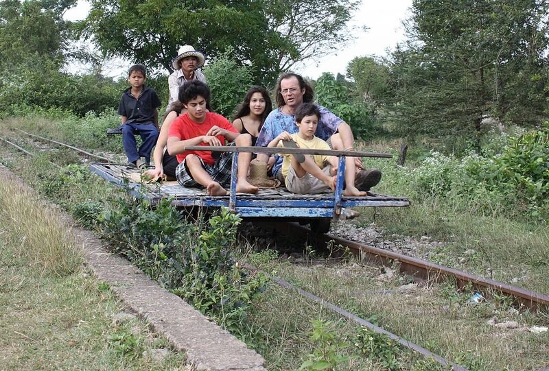Tourists on a norry train in Battambang, Cambodia