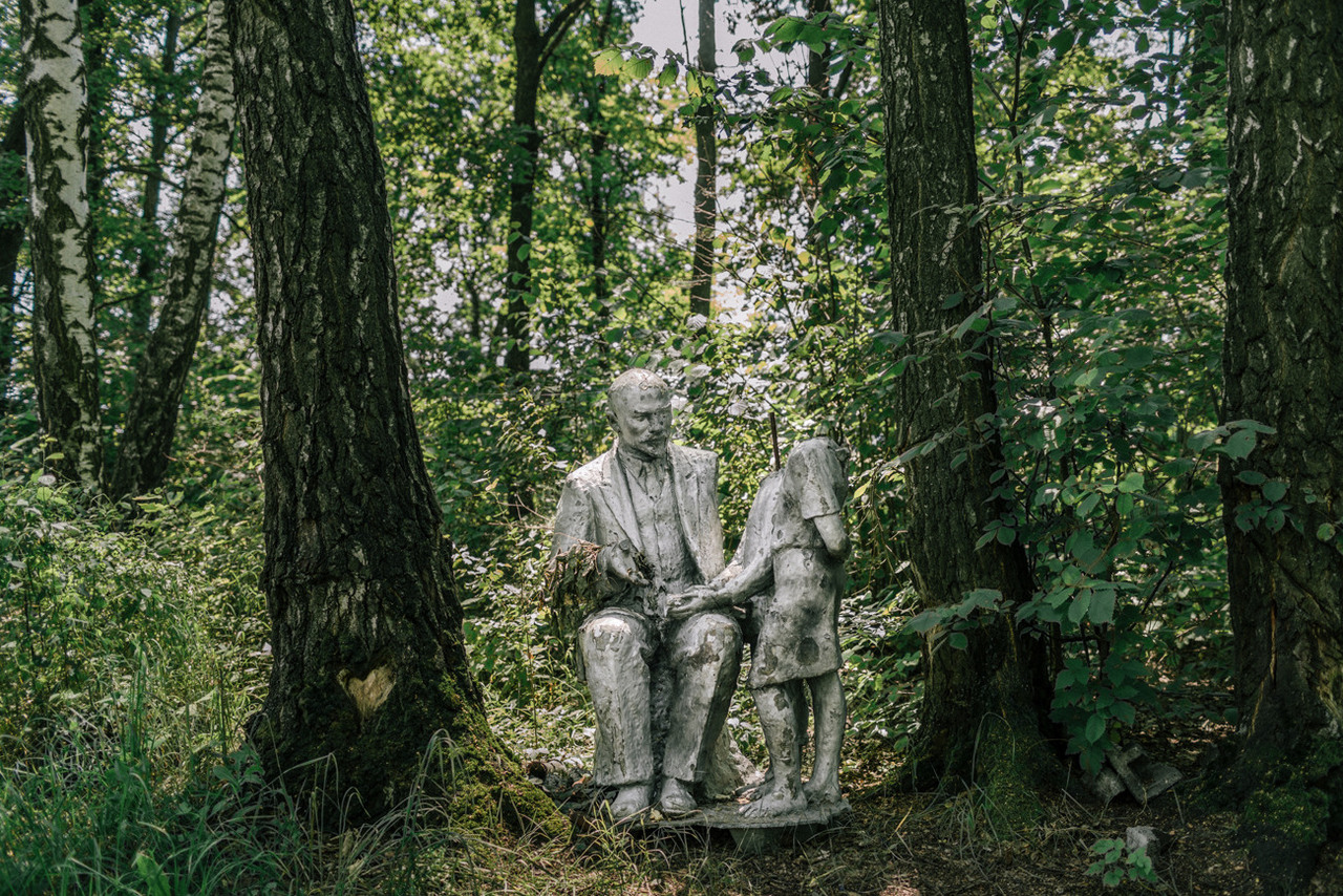 A Lenin monument hidden in a forest. The mayor explained "It’s the last one in the region, and we never know what the next government will be like." Local youths built a table next to it that is now a popular gathering place. Horbani, Kiev Region, July 2016.