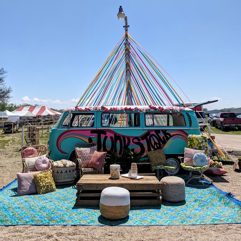 A rest area at Junkstock, where food, music, and 200+ flea market vendors come together on the grounds of an old Nebraska horse farm.