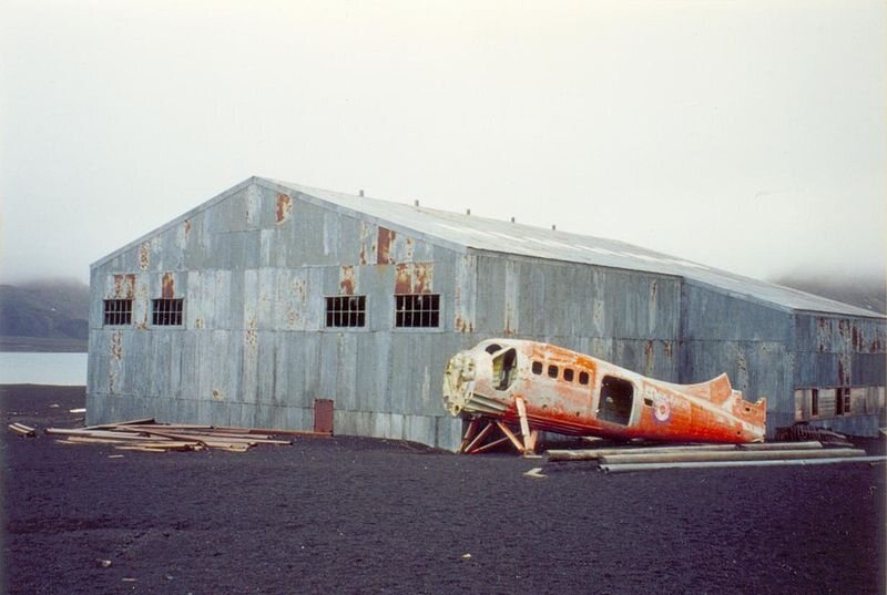 Abandoned hangar and fuselage