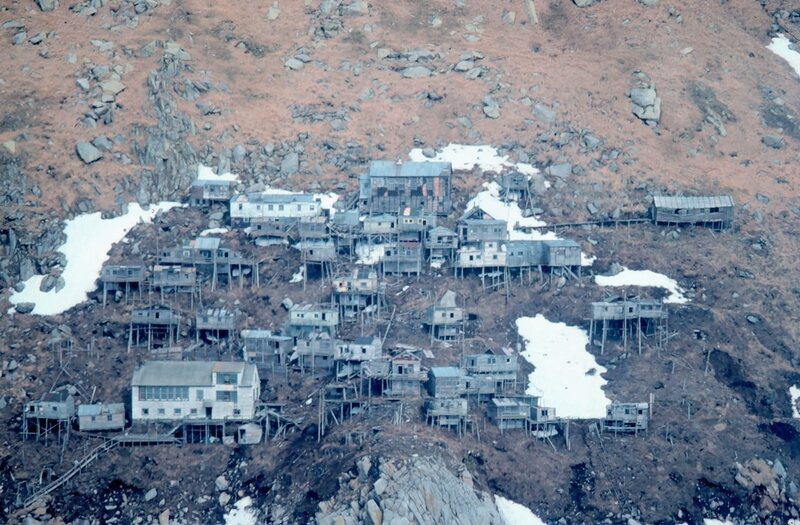 Deserted stilt village of Ukivok on King Island