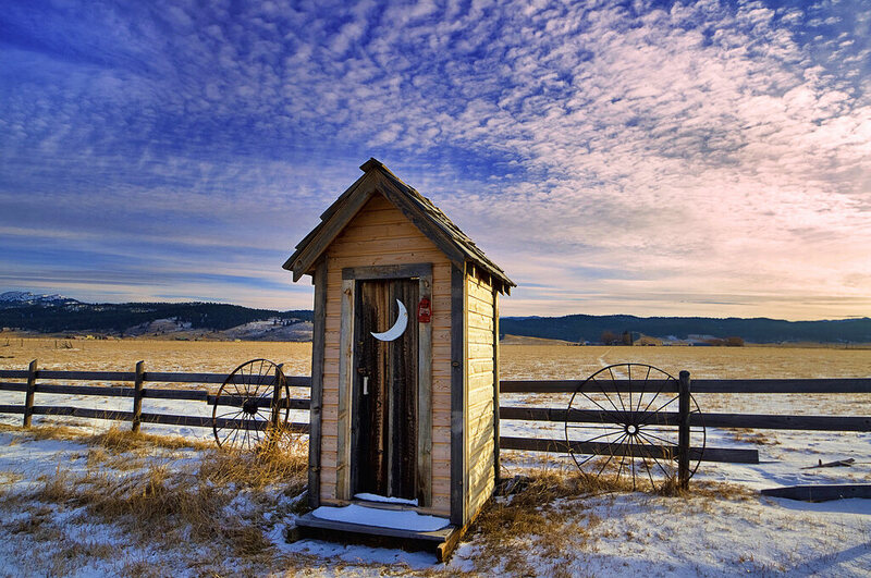 Why We Think Outhouses All Had Crescent Moons In Their Doors