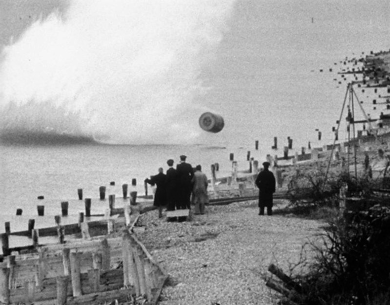 A practice (inert) bomb is bounced during a training flight by members of RAF 617 Squadron at Reculver bombing range in Kent.