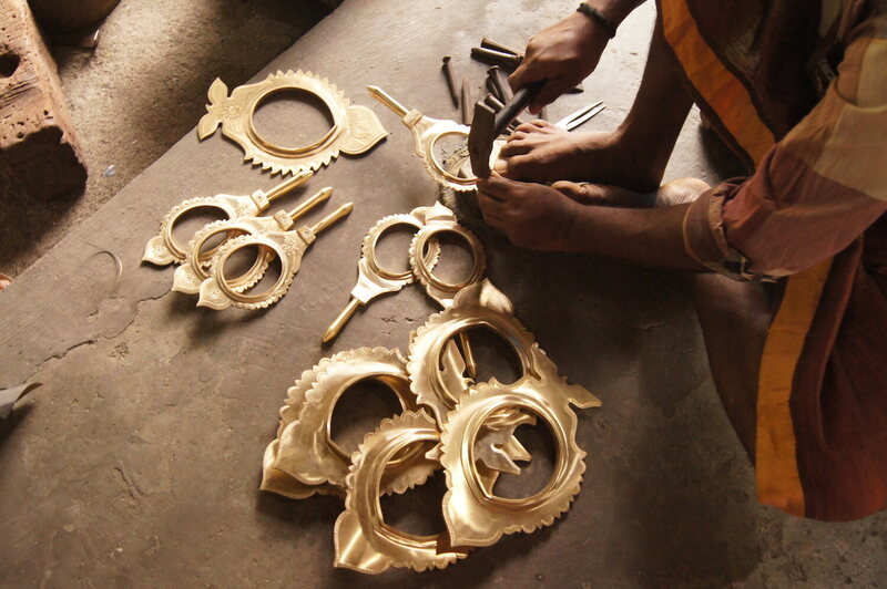 Brass frames for the mirrors being etched.