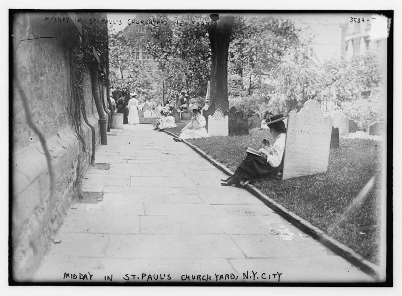 Enjoying a book and a snack in a Lower Manhattan cemetery.