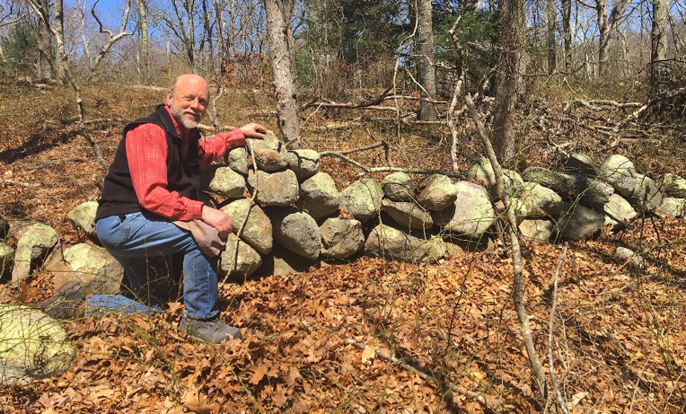 Robert Thorson with a stone wall, Kettle Pond National Wildlife Refuge, Rhode Island. 