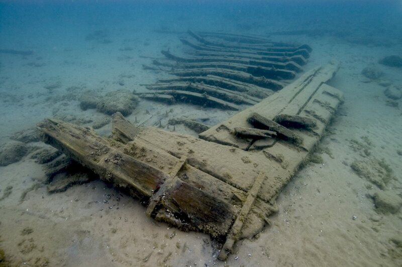 Some wrecks lay flush against the sand. 