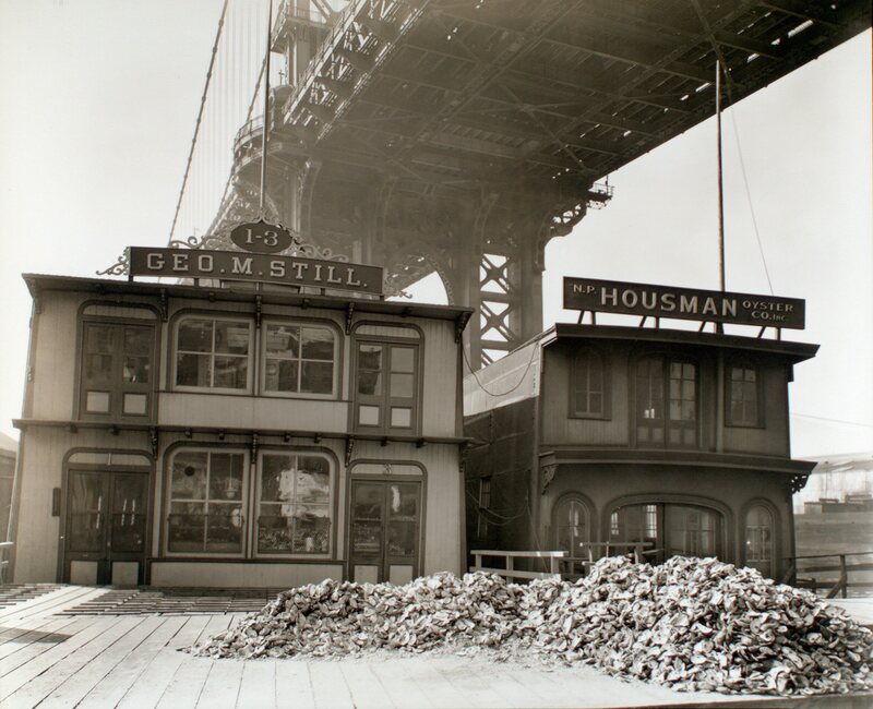 Oyster shells piled up near the South Street Seaport in Manhattan, photographed by Bernice Abbott in 1937.