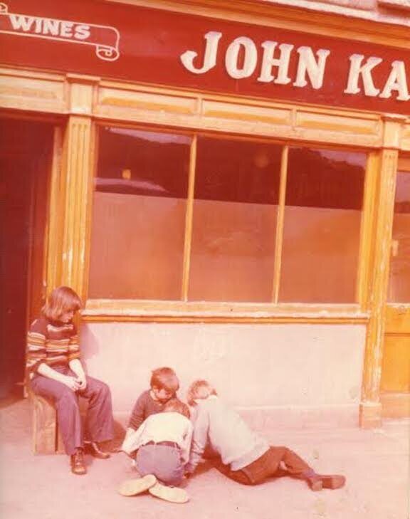 Anne, Anthony, Ciarán, and Eoin play in front of the pub sometime in the late 1970s. 