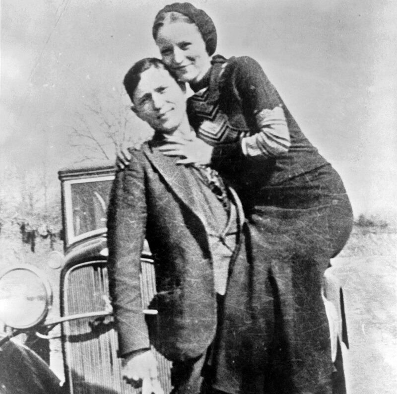 Bonnie and Clyde with their 1932 Ford V8, circa 1932-1934.