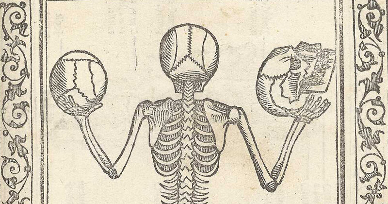 Skeleton holding a skull