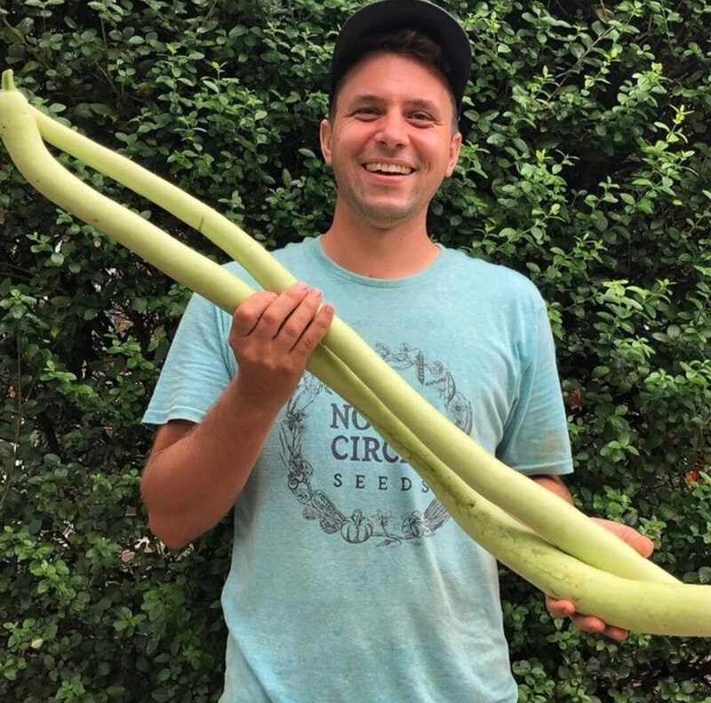 Owen Taylor holds a cucuzza, or 