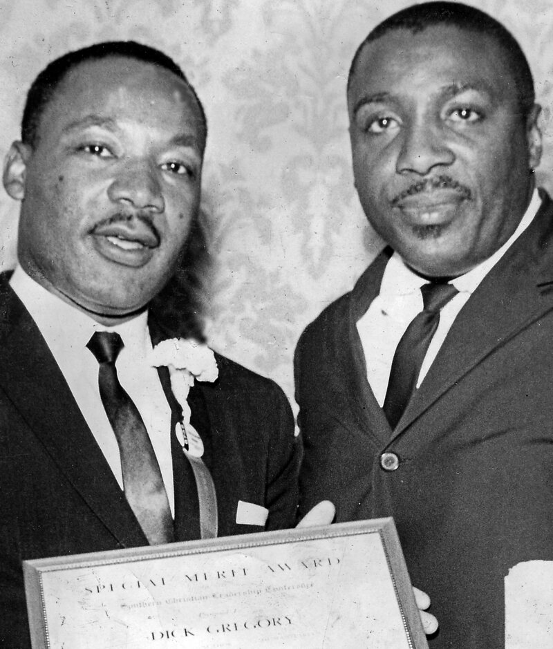 Gregory with Dr.  Martin Luther King Jr. after the comedian won the 1963 Southern Christian Leadership Conference Merit Award.