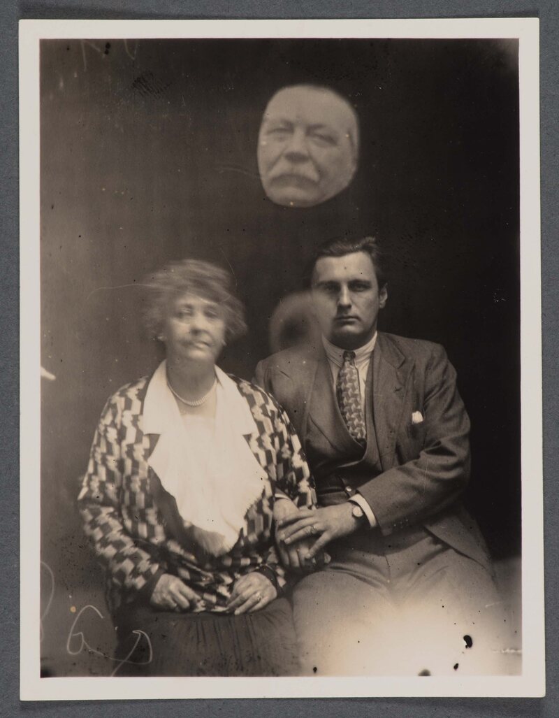 A year after Doyle's death, his wife, Jean, and one of his sons posed for this spirit photograph. Jean, like her husband, was a believer in Spiritualism.