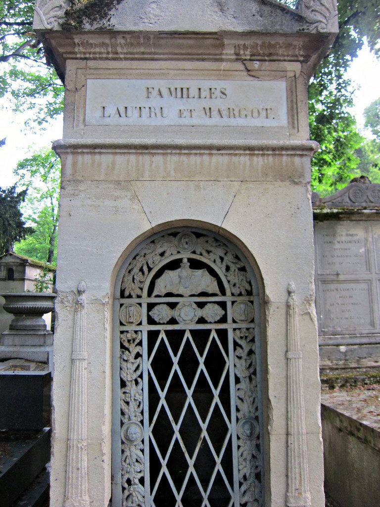 Bat tomb symbol in Pere Lachaise Cemetery in Paris