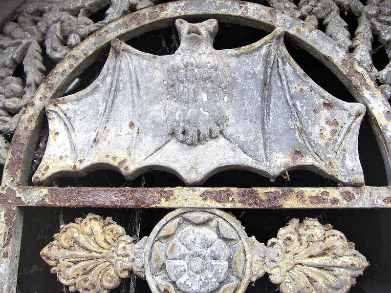 Bat tomb symbol in Pere Lachaise Cemetery in Paris