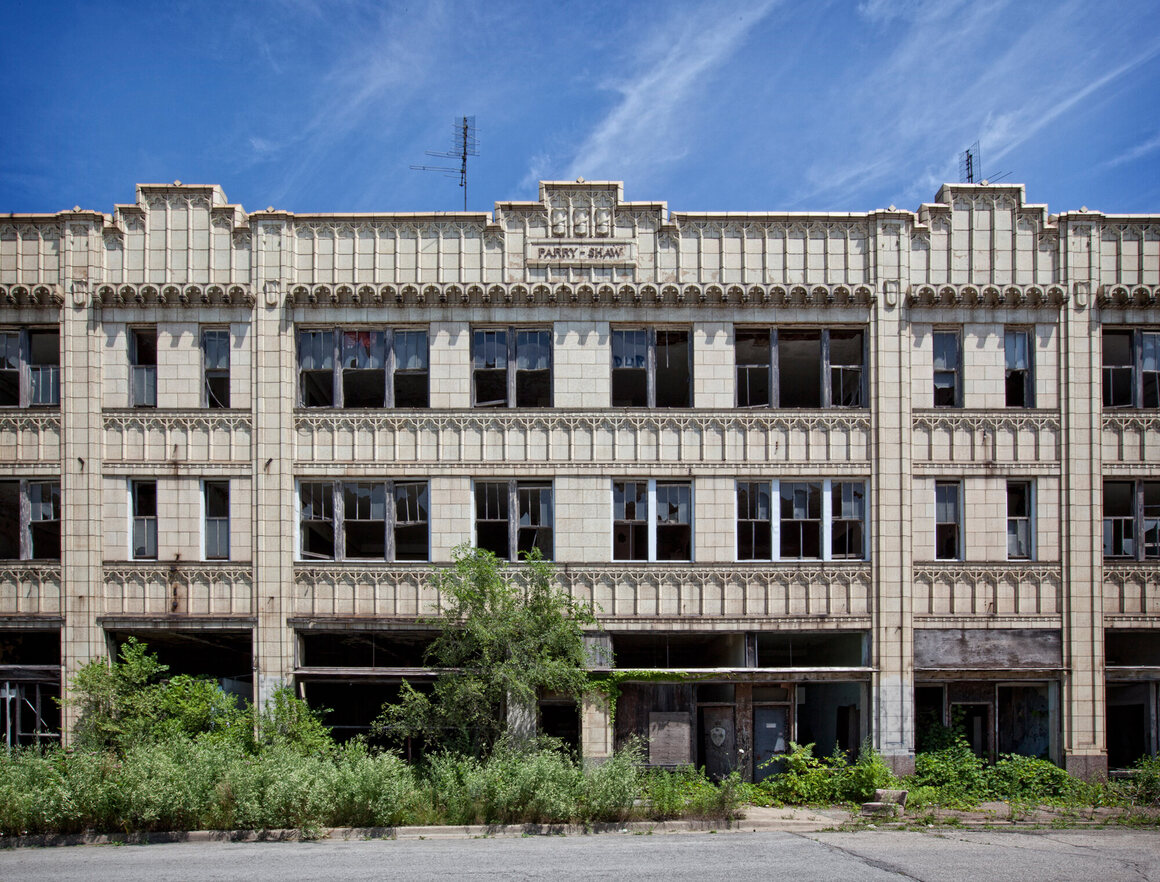 The Parry Shaw Building, with overgrowth outside the building.
