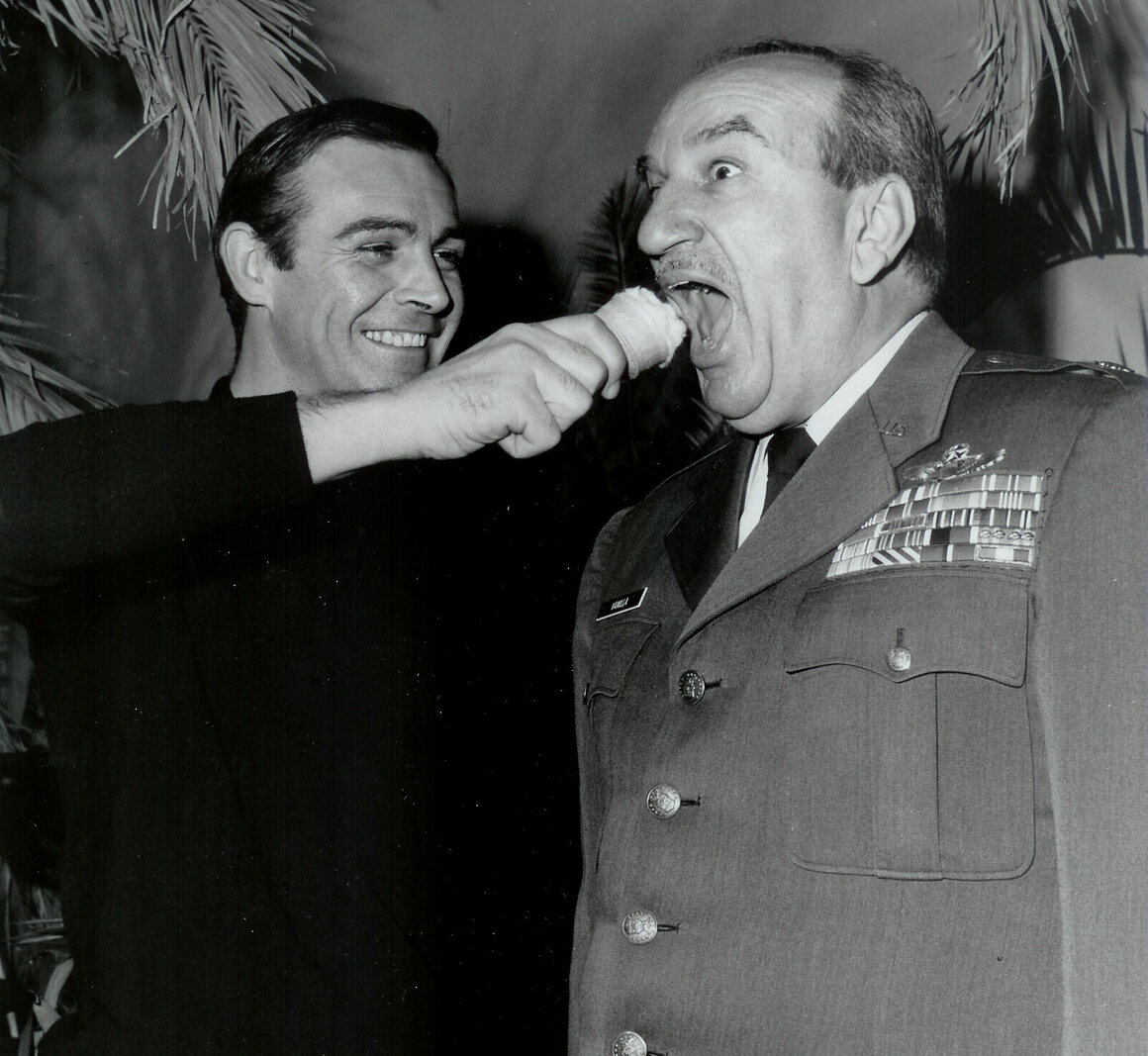 Sean Connery feigns shoving a vanilla ice cream cone in retired Lt. Col. Charles Russhon’s face on set during <em>Thunderball</em>. Russhon was the military adviser to the Bond films in the 1960s and 1970s and eventually became friends with Connery. 