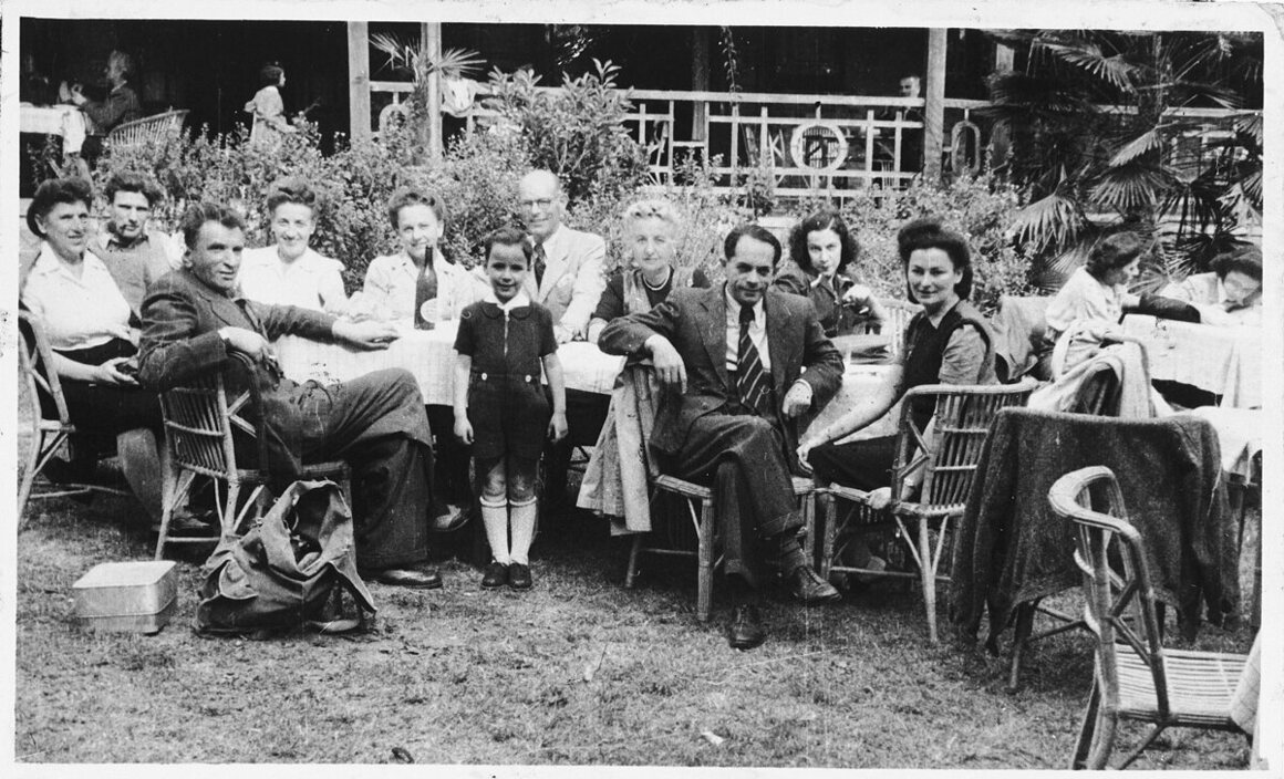 Jewish refugees socialize in a garden in Shanghai.