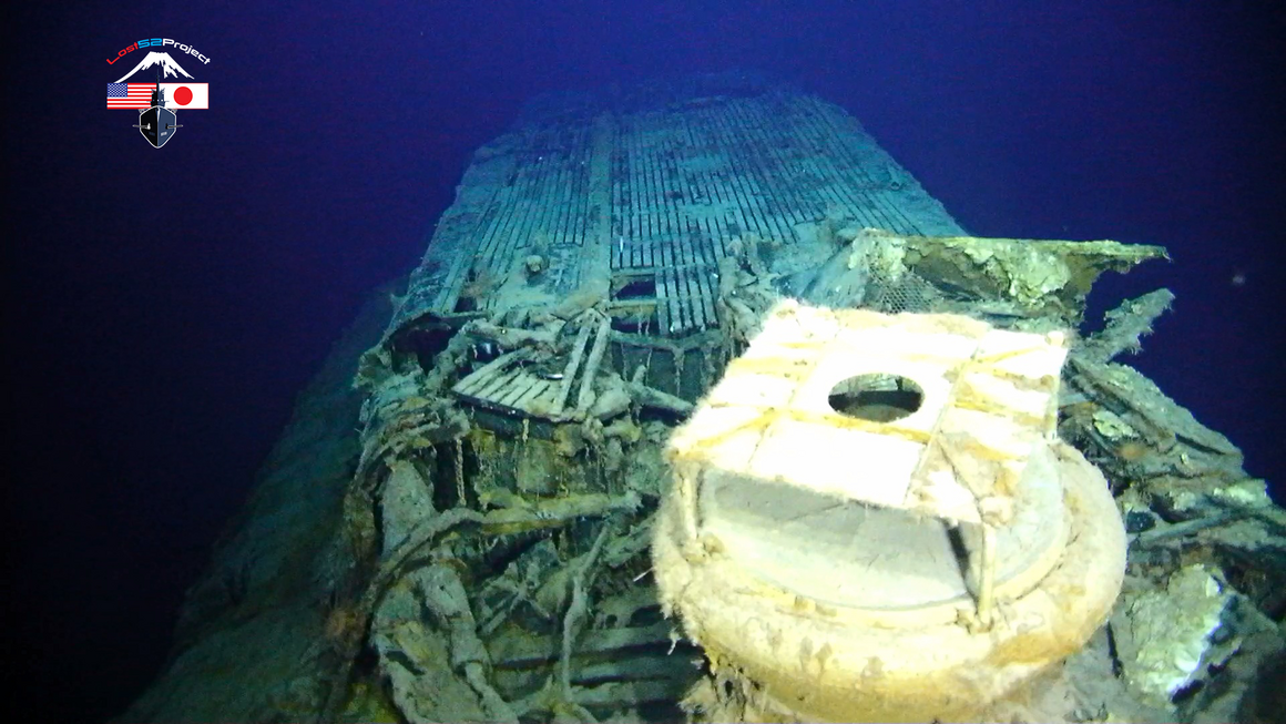 The <em>Stickleback</em>'s stern, resting two miles under the sea.