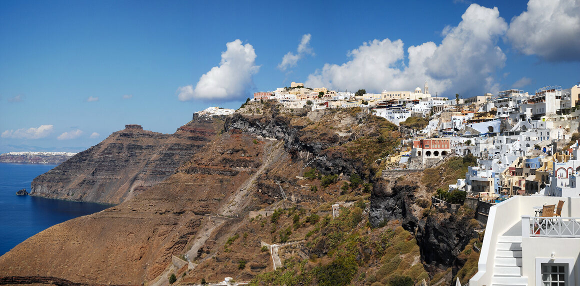The modern town of Fira, on the Greek island of Santorini, is built on the cusp of the ancient volcano's caldera.