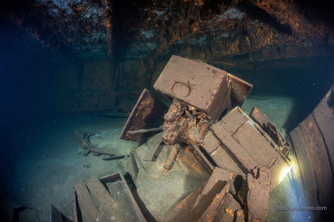 The main intrigue lies in the ship's cargo hold, where wooden crates hint at what may be Nazi loot from Eastern Europe.