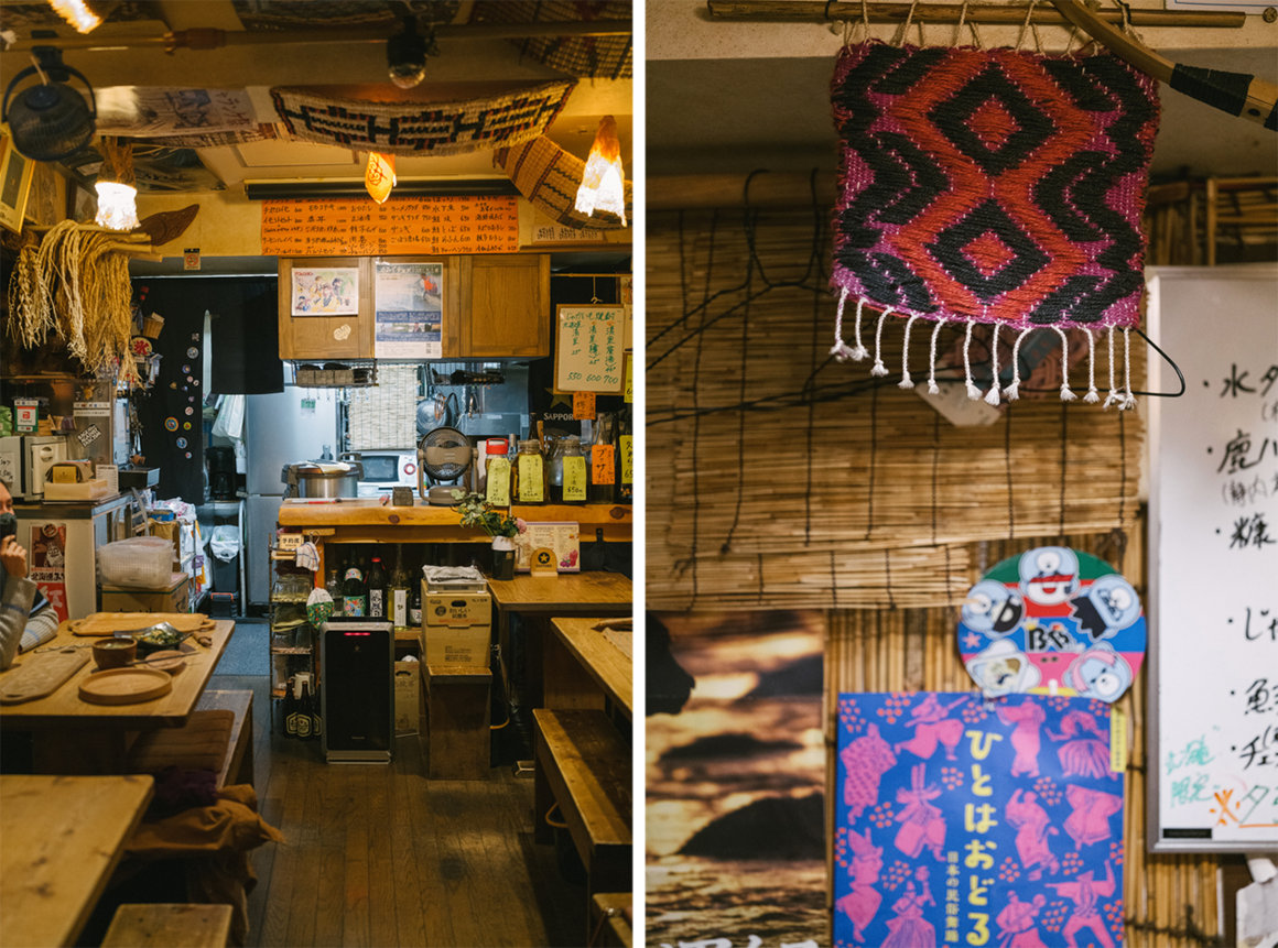 Harukor has only five tables and the kitchen is at the far end of the restaurant. The fabric on the right features an Ainu pattern, and the poster is of an Ainu dance performance. 