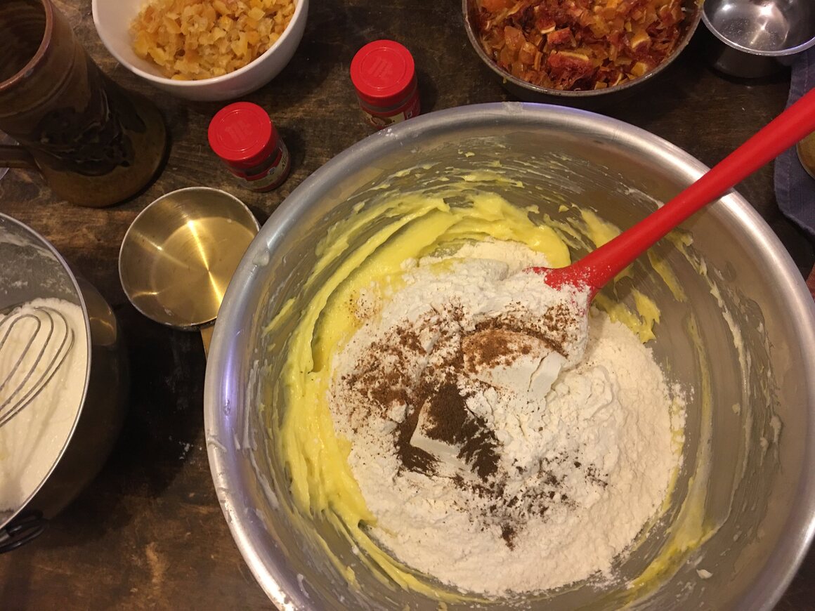 Combine the dry ingredients with the butter and sugar.