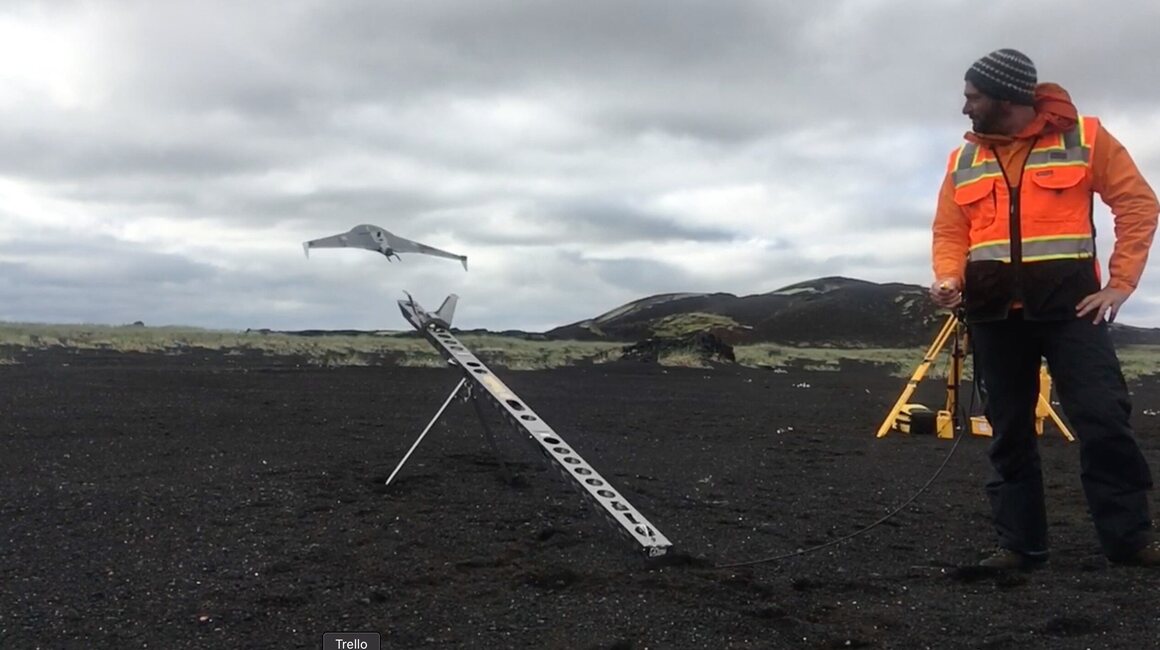 Hamilton launches a drone in Iceland. 