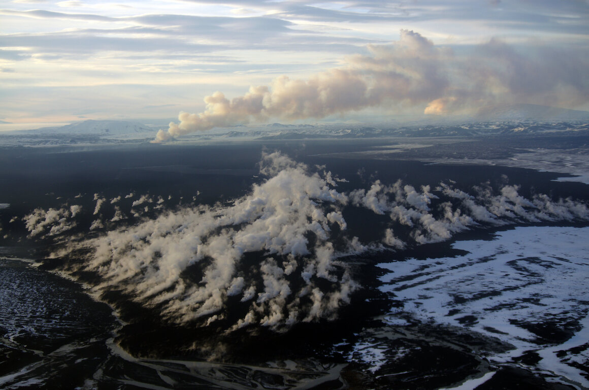 Steam blowing over the Holuhraun lava field in Iceland. 