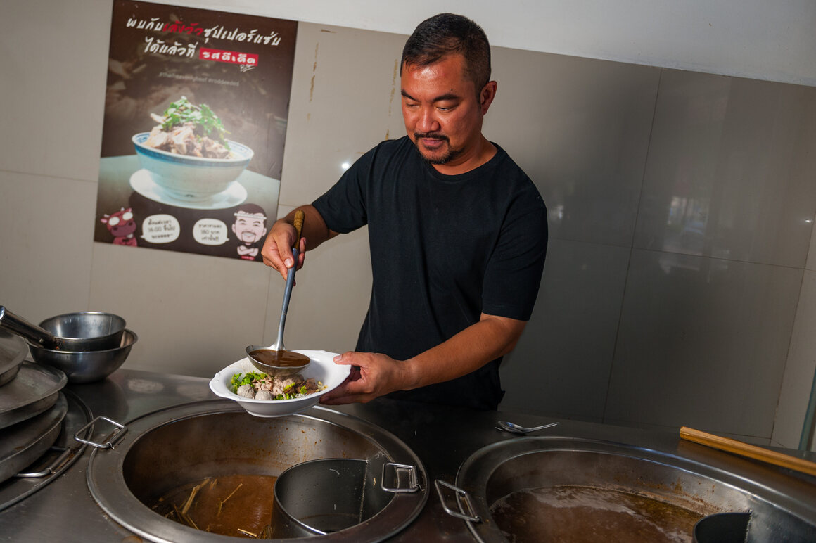 Sittichan Vuttipornkul, the second-generation owner of Rod Dee Ded, in Bangkok, tastes a noodle stock that includes marijuana stems and roots.