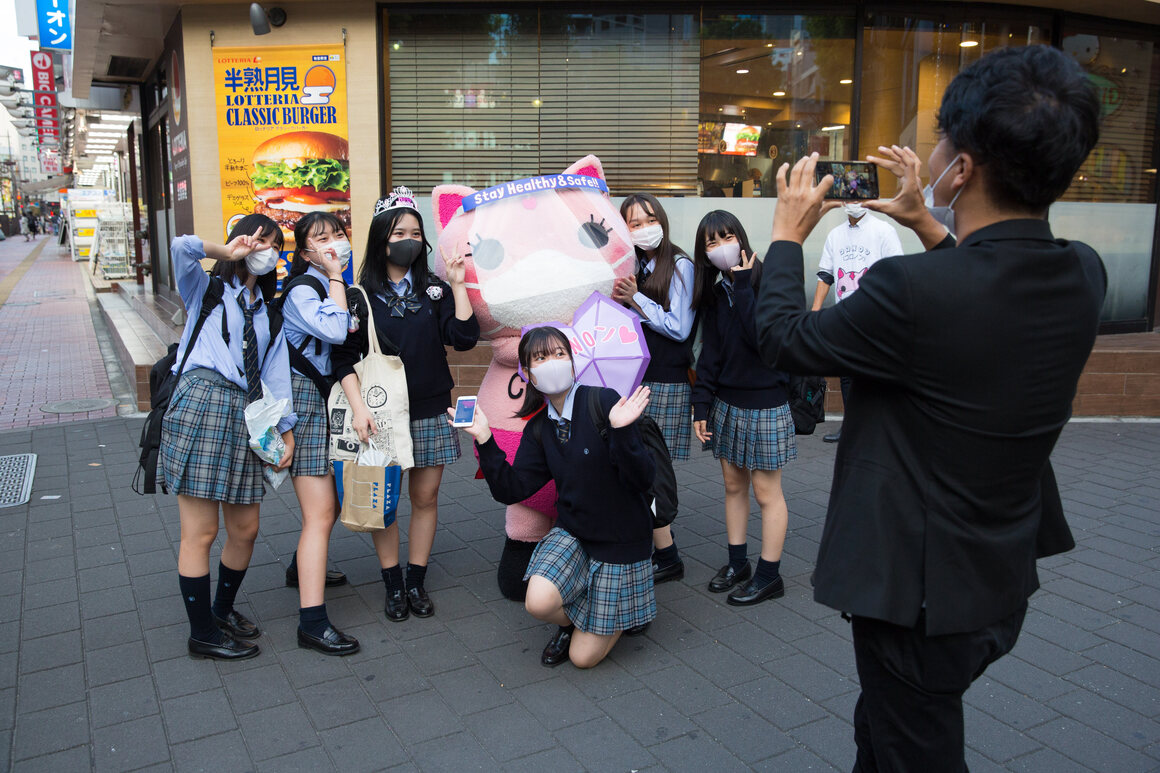 Koronon in Ikebukuro, flanked by fans.