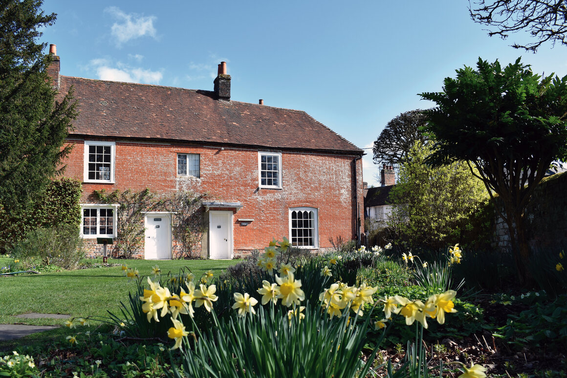 Chawton Cottage, where Jane, Cassandra, and Mrs. Austen lived with Martha Lloyd. The building is now a Jane Austen museum.