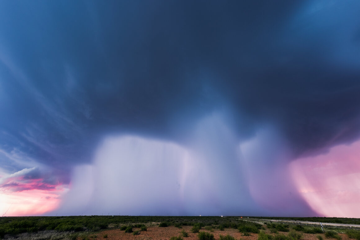 A monster, four-pillar downburst from dying supercell near Andrews, Texas. 