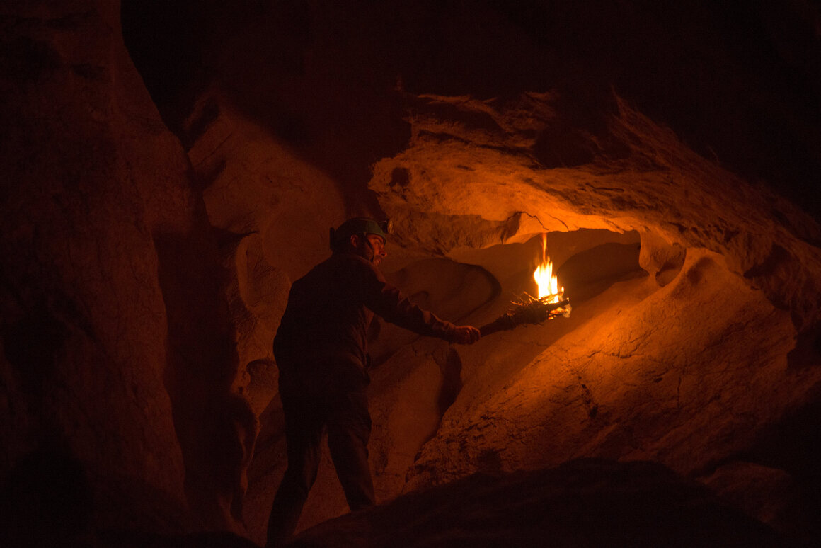 The experience of moving through a cave by torchlight is far different than with modern light sources.