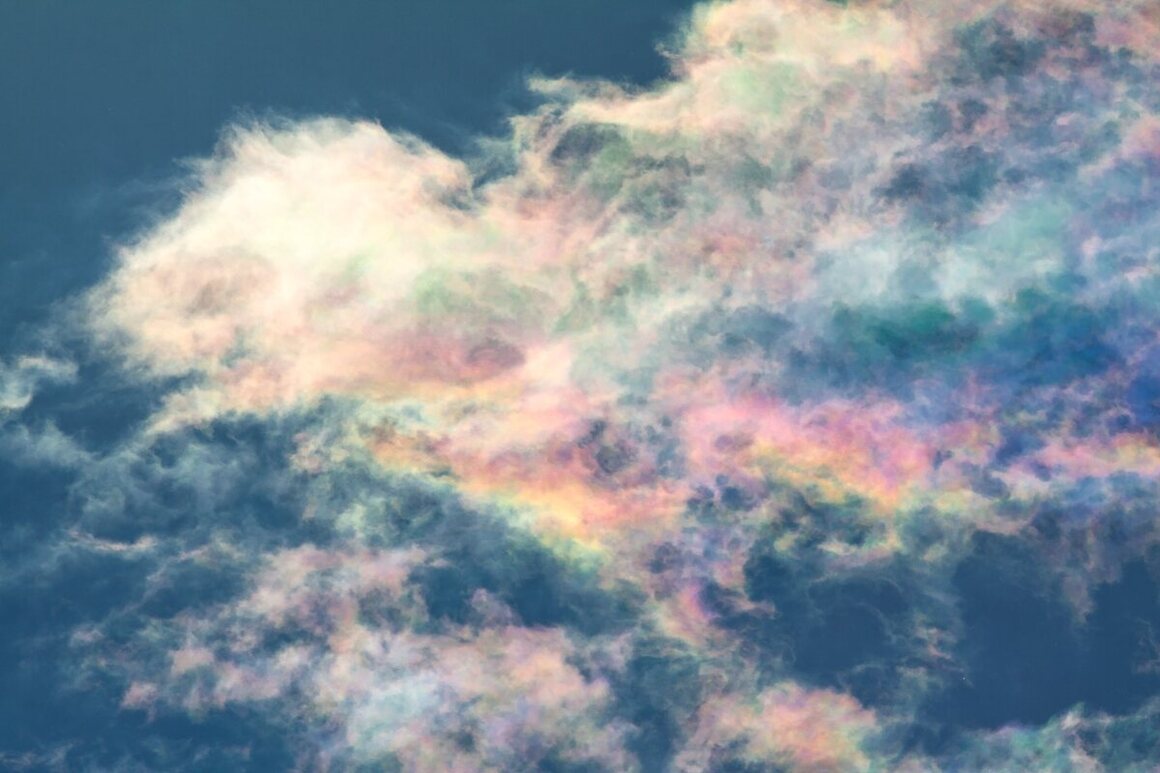 Iridescent clouds look like melted sherbet.