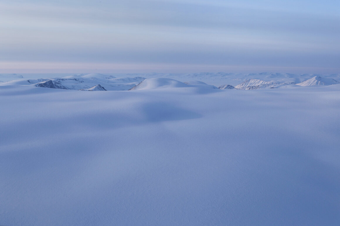 Greenland's vast ice cap is surpassed only by Antarctica and is under unprecedented stress.