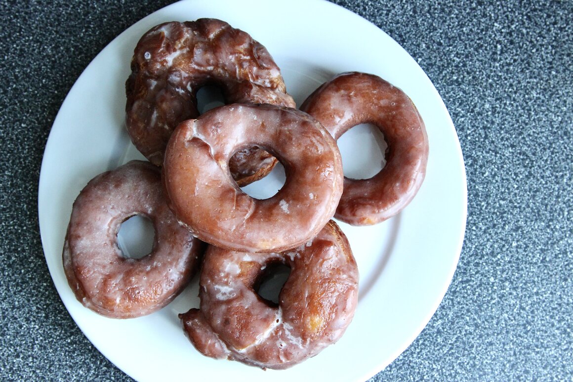 The recipe yields glazed doughnuts with an exceptionally airy, tender crumb.