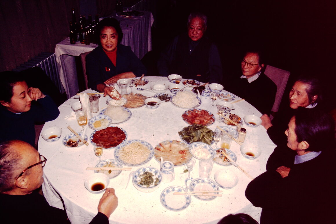 Chen (third from left) with family and friends at a dinner in Shanghai.