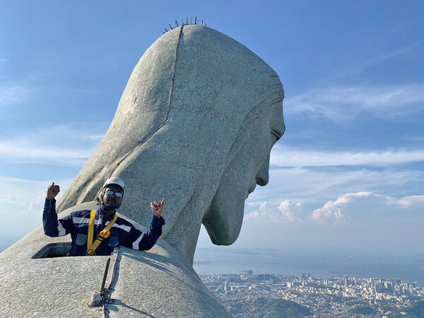 Lately, from the ground far  below, Rio’s famed Christ the Redeemer statue appears to be cupping tiny people in its mighty hand. It’s no m