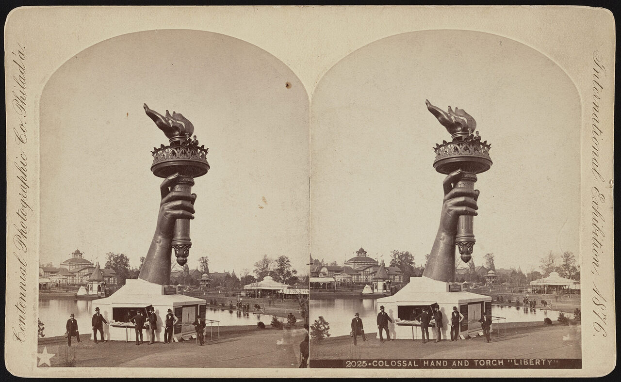 The torch and part of the arm of the Statue of Liberty, on display at the 1876 Centennial Exhibition in Philadelphia. 