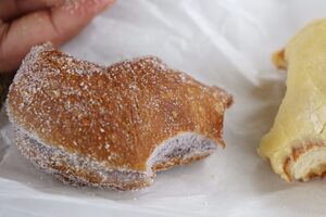 Taro and passionfruit-glazed malasadas. 